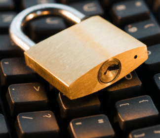 Padlock resting on a computer keyboard